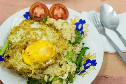 Fried rice and fried egg Stock Photos