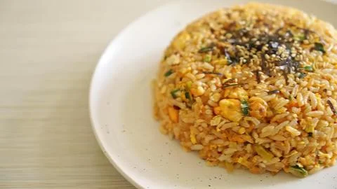 Fried rice ball with vegetables on a white plate Stock Photos