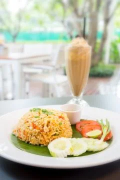 Fried rice with coffee Stock Photos