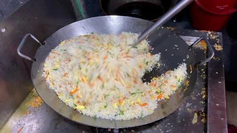 Fried rice making Stock Footage 283885231