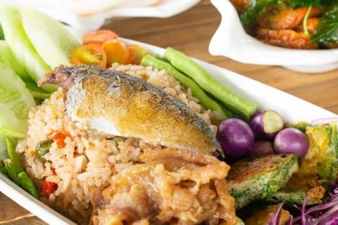 Fried rice mixed shrimp paste sauce with mackerel and omelet mixed Cha-om veg Stock Photos