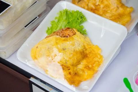 Fried Rice omelet box packed in Thailand Stock Photos