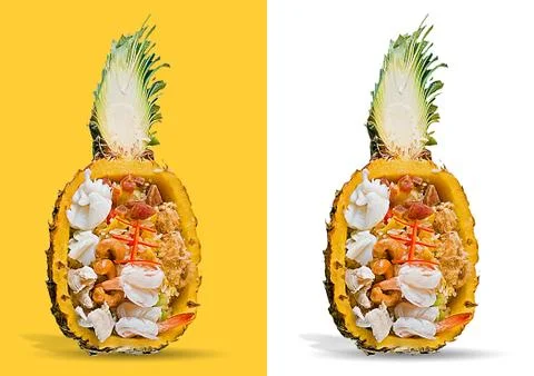 Fried rice served inside pineapple isolated Stock Photos