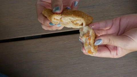 Fried Risoles getting open up with mayonnaise inside.Risol Mayo is a typica.. Stock Footage 294278165