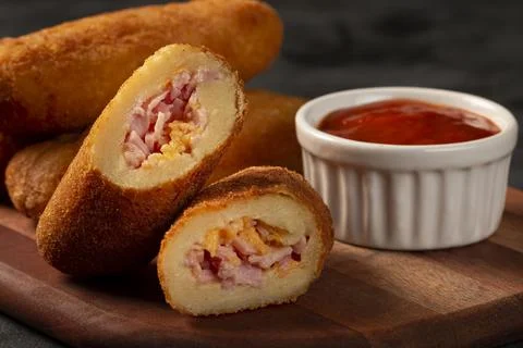 Fried risoles or Risol. Risoles stuffed with cheese and ham. Stock Photos