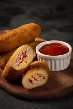 Fried risoles or Risol. Risoles stuffed with cheese and ham. Stock Photos