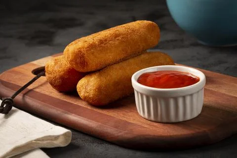 Fried risoles or Risol. Risoles stuffed with cheese and ham. Stock Photos