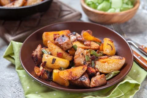 Fried roasted potatoes with meat Stock Photos