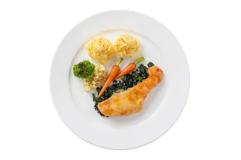 Fried salmon with spinach Stock Photos