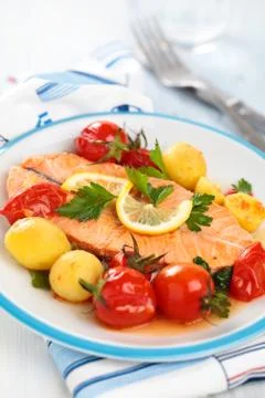Fried Salmon  with vegetables. Stock Photos