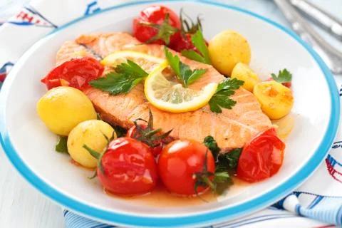 Fried Salmon  with vegetables. Stock Photos