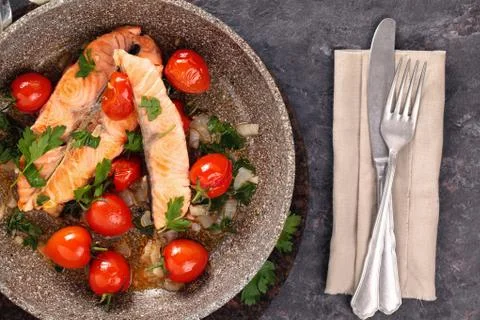 Fried salmon  with vegetables. Stock Photos