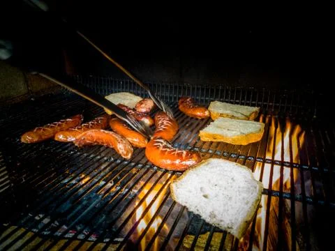 Fried sausage on fire Stock Photos