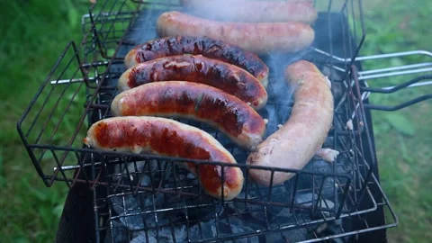 Fried sausages on fire Stock Footage 137587437