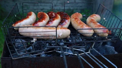 Fried sausages on fire Stock Footage 137587508