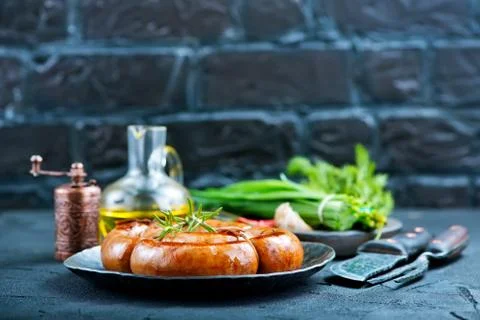 Fried sausages Stock Photos