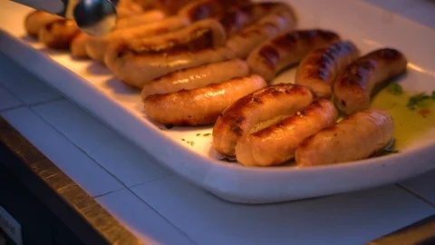 Fried sausages at the plate Stock-Footage 110787548