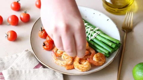 Fried shrimp with asparagus and tomatoes. Healthy eating. Diet. Stock Footage 244304591