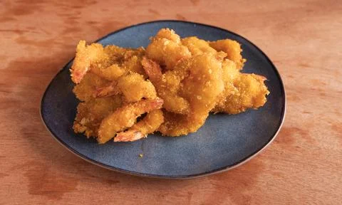 Fried shrimp with crispy breading on plate 写真素材