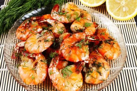 Fried shrimp with dill, macro, background Stock Photos