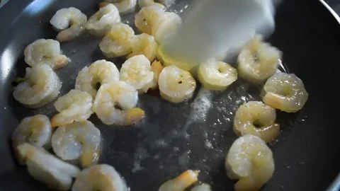 Fried shrimps in a frying pan Stock Footage 78189761