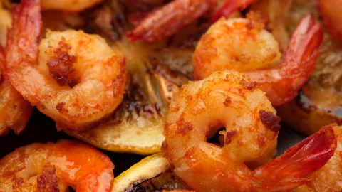 Fried shrimps with lemon top view rotating. closeup Stock Footage 132551153