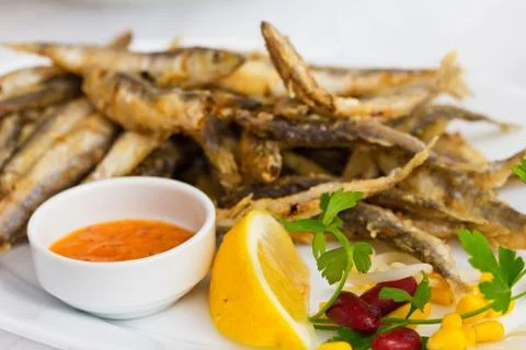 Fried sprat with souce Stock-Fotos