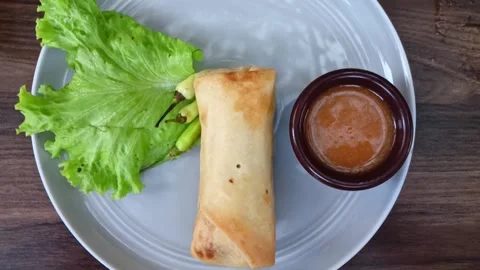 Fried spring roll filled with young bamboo shoots, typical of Central Java Stock-Footage 322594077