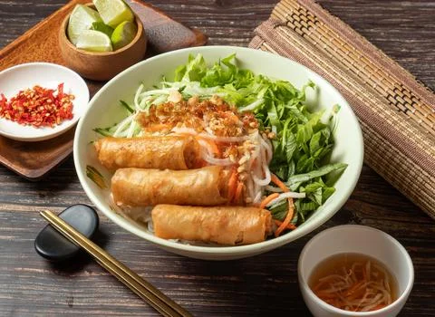 Fried Spring Rolls Cold Rice Vermicelli with sauce served in bowl isolated .. Stock Photos
