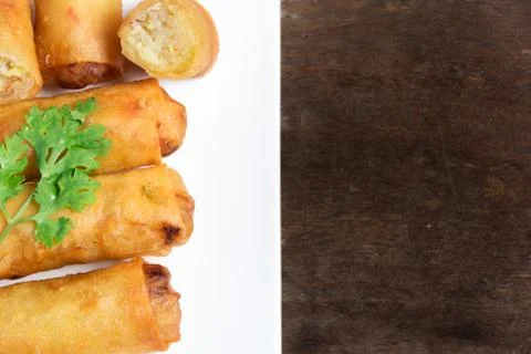 Fried Spring Rolls Stacked on white plate .top view 스톡 사진