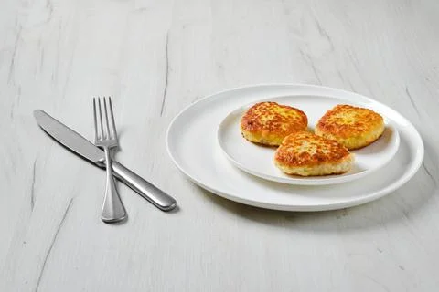 Fried squid cutlet in breading on a plate Foto stock