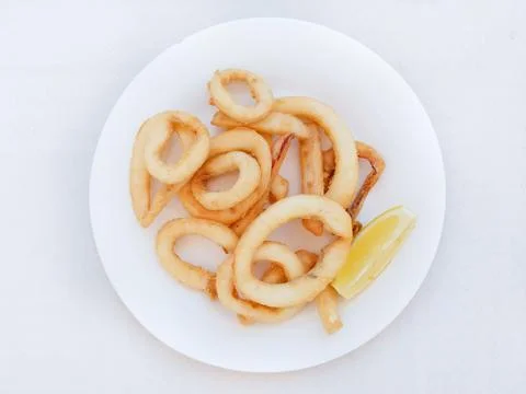 Fried squid, overhead view Stock Photos