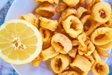 Fried squid rings breaded Stock Photos