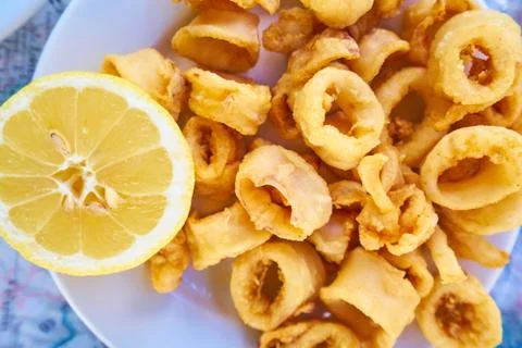 Fried squid rings breaded Stock Photos