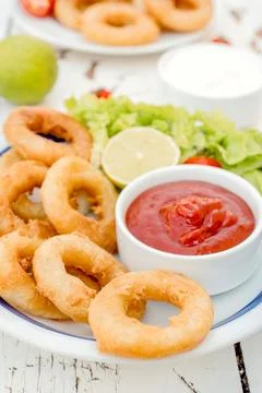 Fried squid rings Stock Photos