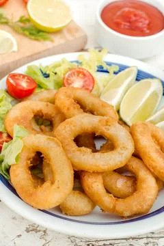 Fried squid rings Stock Photos