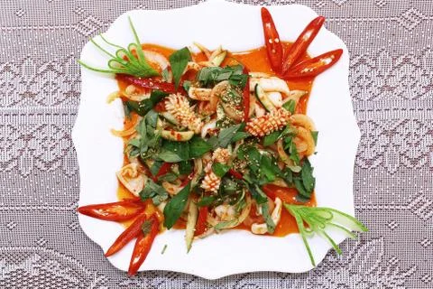 Fried squid with salad Stock Photos