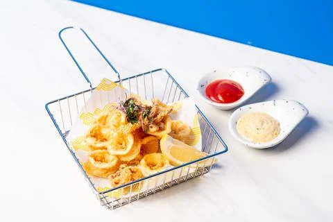 Fried squid with sauce - calamari 写真素材