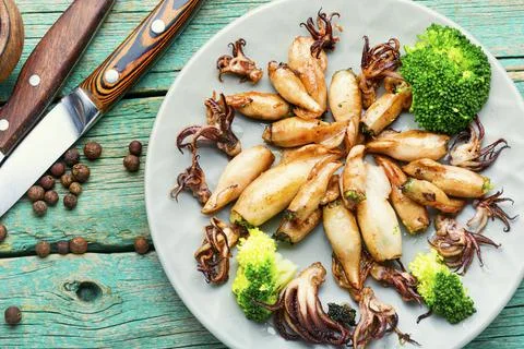Fried squid with vegetables Stock Photos