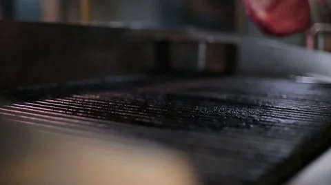 Fried steak on the grill Stock Footage 67862558