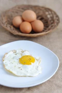 Fried sunny side up egg Stock Photos
