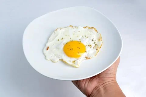 Fried sunny side up egg Stock Photos