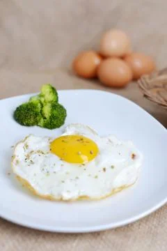 Fried sunny side up egg Stock Photos