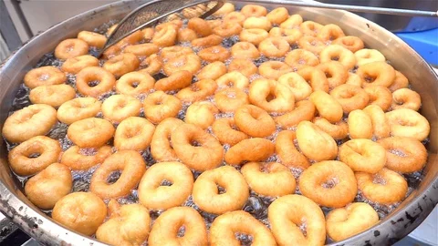 Fried Sweet Dough Stock Footage 128772858