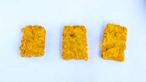 Fried tempeh flour with white background, suitable for menu books, recipes .. Stock Photos