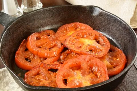 Fried tomatoes Stock Photos