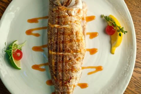 Fried trout with Stock Photos