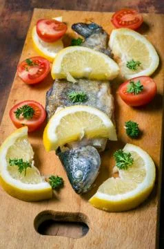 Fried trout on table Stock Photos