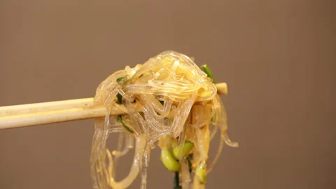 Fried vegetable ingredients with bean sprouts, leek and vermicelli (6) Stock Footage 202208166