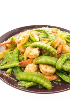 Fried vegetable with shrimp or prawn in plate Stock Photos